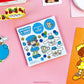 Scratch 'N' Sniff sticker sheet with cartoon characters on a pink background