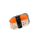 Sushi-shaped hair clip with orange fish and white rice on a white background