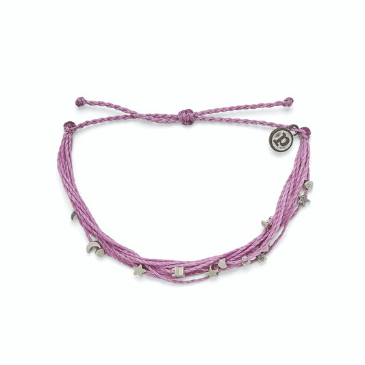 Pink bracelet with silver star and moon charms on a white background