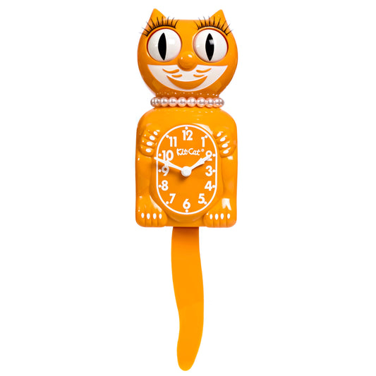 Orange vintage Kitty Kat Klock with pearls on a white background