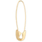 Gold safety pin on a white background