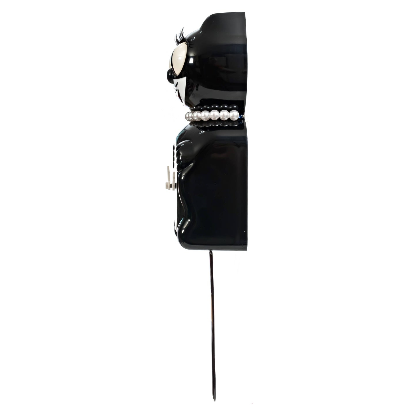 Black vintage-style phone with pearl accents on a white background