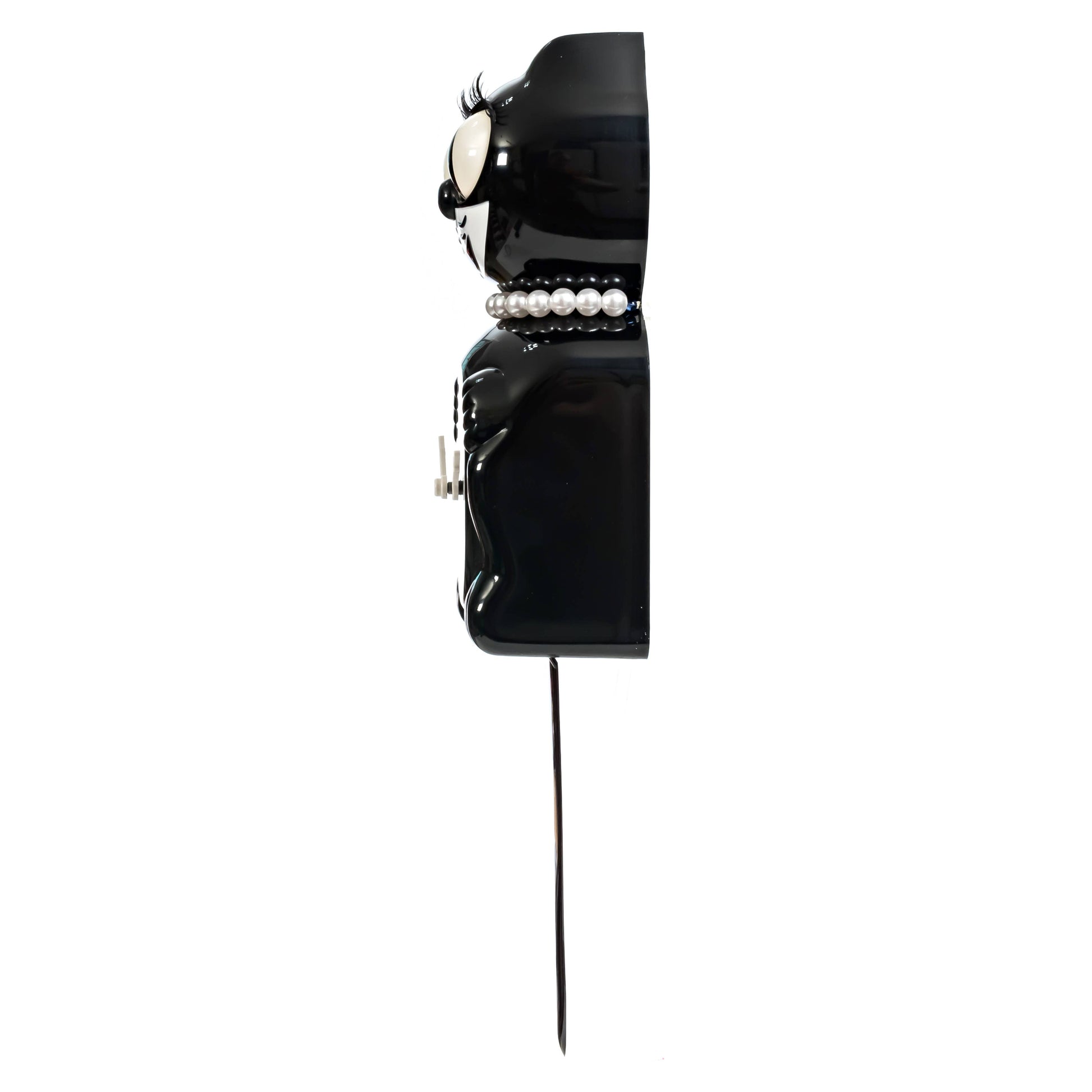Black vintage-style phone with pearl accents on a white background