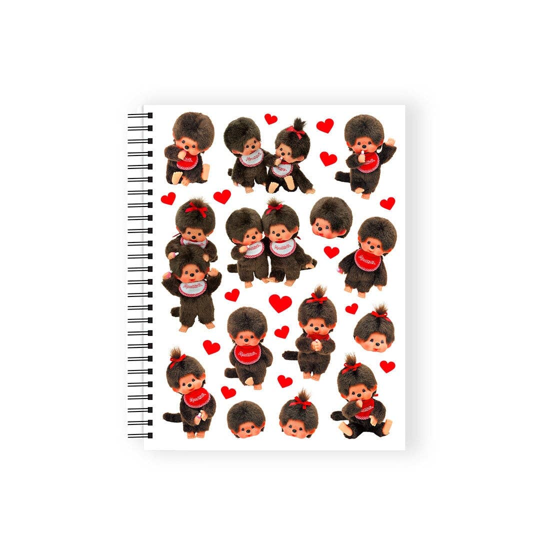 Notebook with Monchhichi character stickers on a white background
