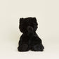 Black cat stuffed animal on a white background