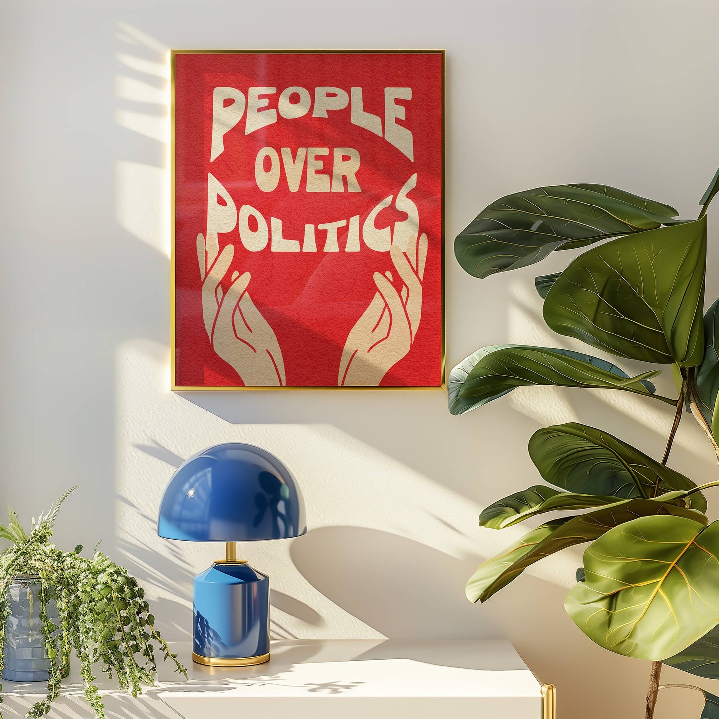 Red poster with 'People Over Politics' text on a wall above a blue lamp and plants.