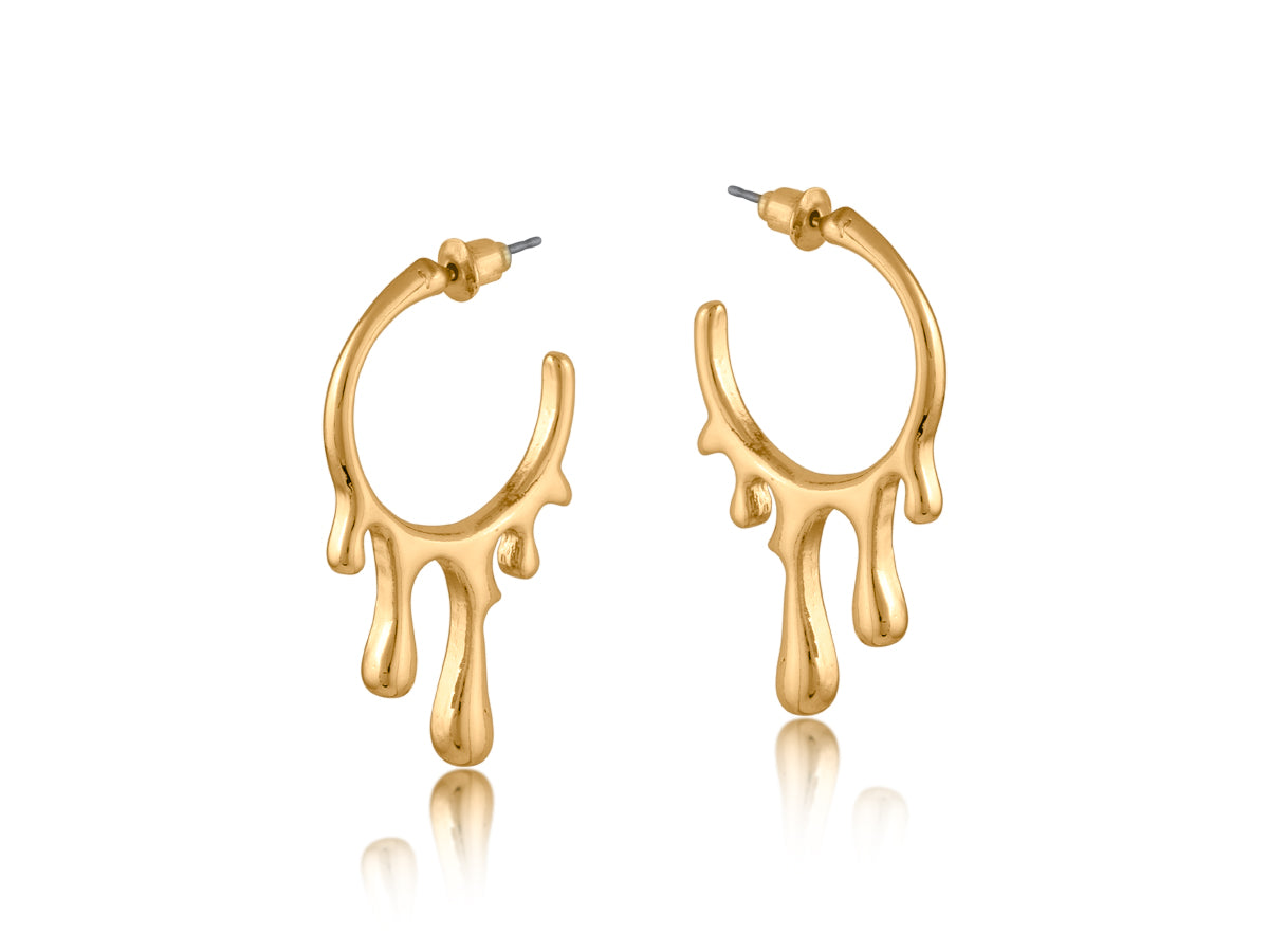 Gold drippy hoop earrings with a unique design on a white background