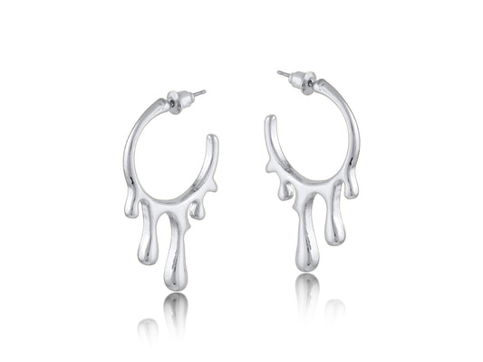 Silver drippy hoop earrings on a white background