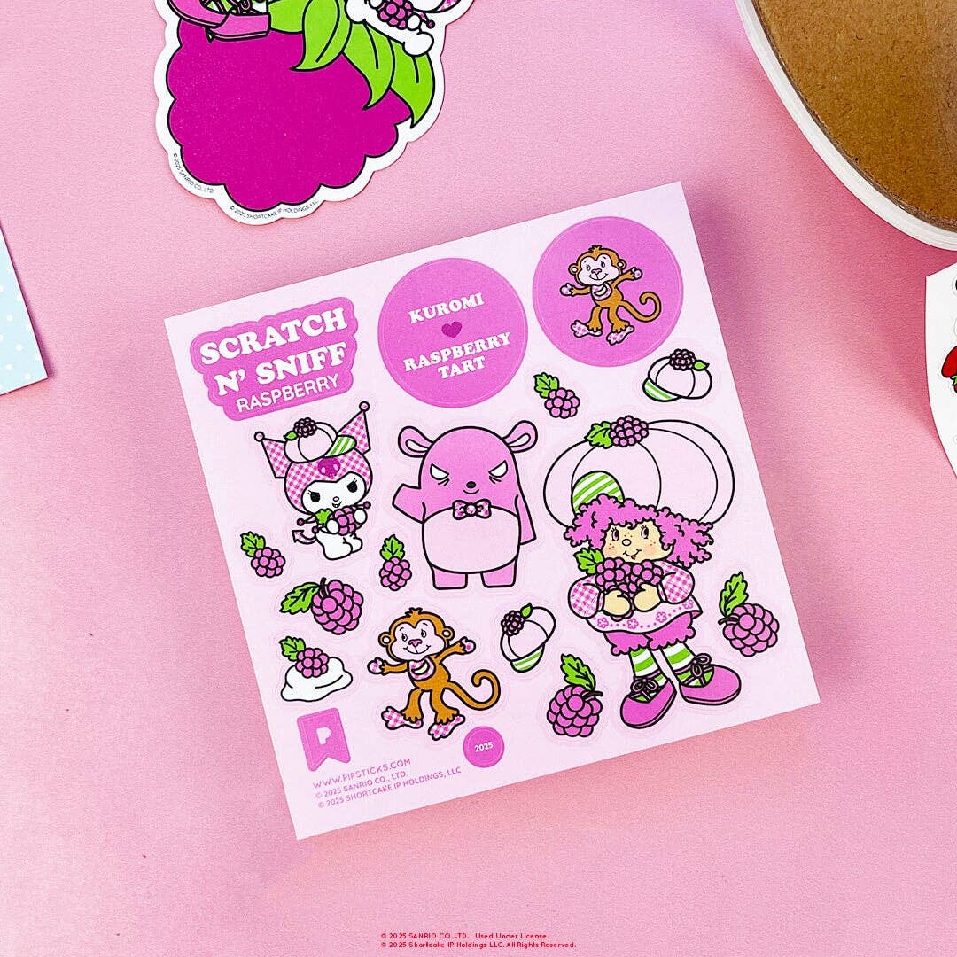 Raspberry Scratch 'N Sniff stickers with Kuromi and Raspberry Tart on a pink background