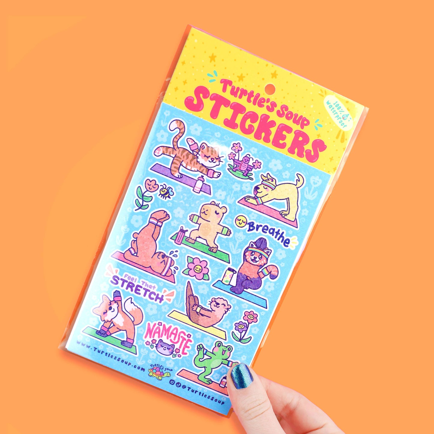 Pack of stickers with cartoon animals on a yoga theme against an orange background