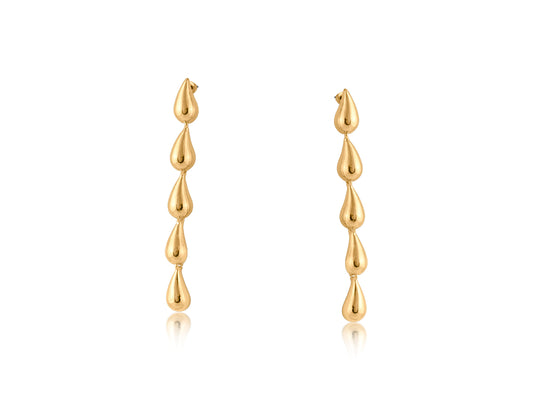 Gold raindrop earrings on a white background