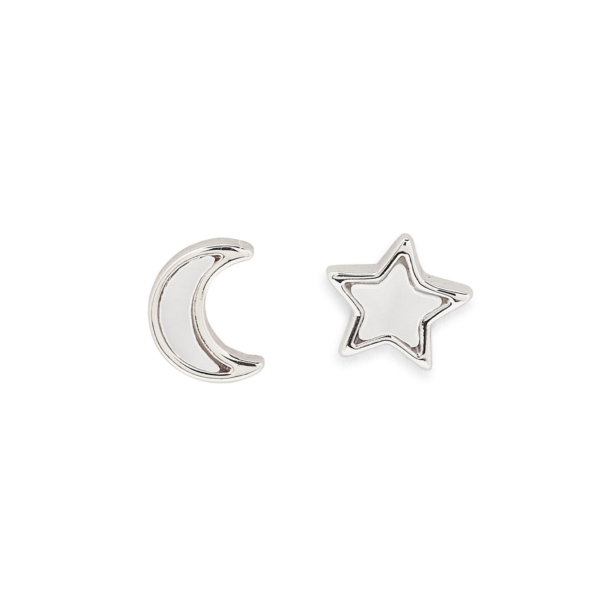 Silver moon and star earrings on a white background