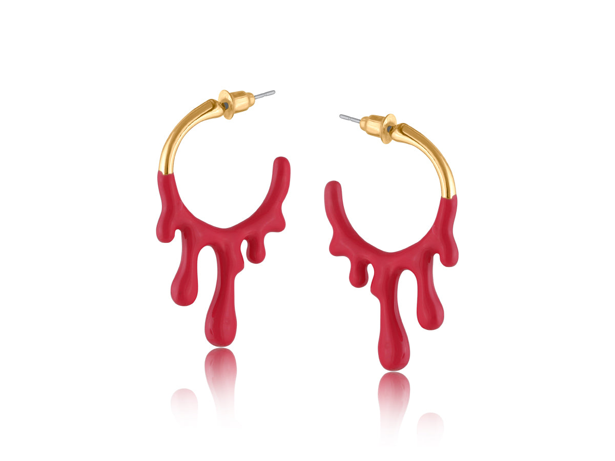 Red drip hoop earrings with gold accents on a white background