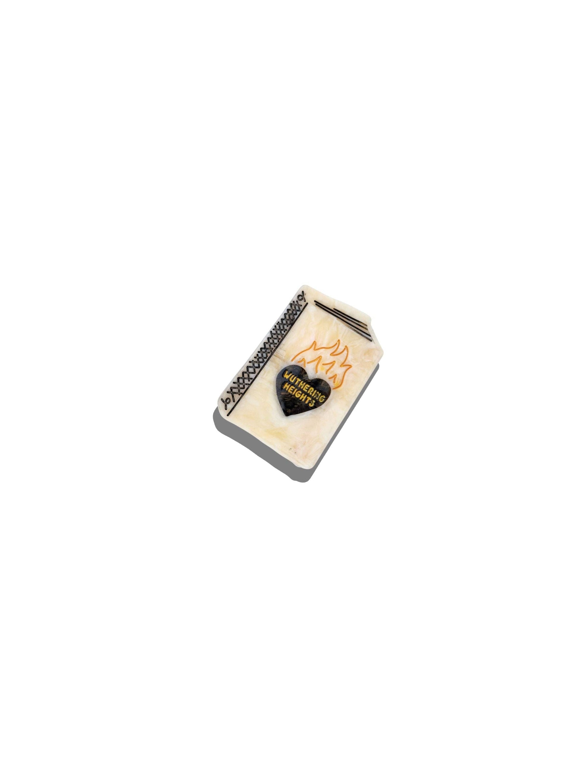 White book claw clip with a heart design that says "Wuthering Heights" on a white background