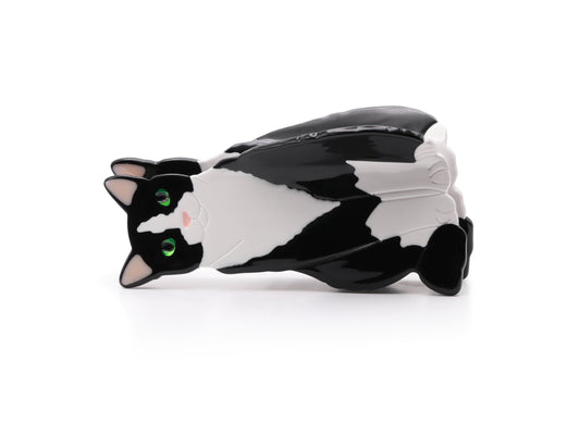 Black and white cat-shaped hair claw on a white background