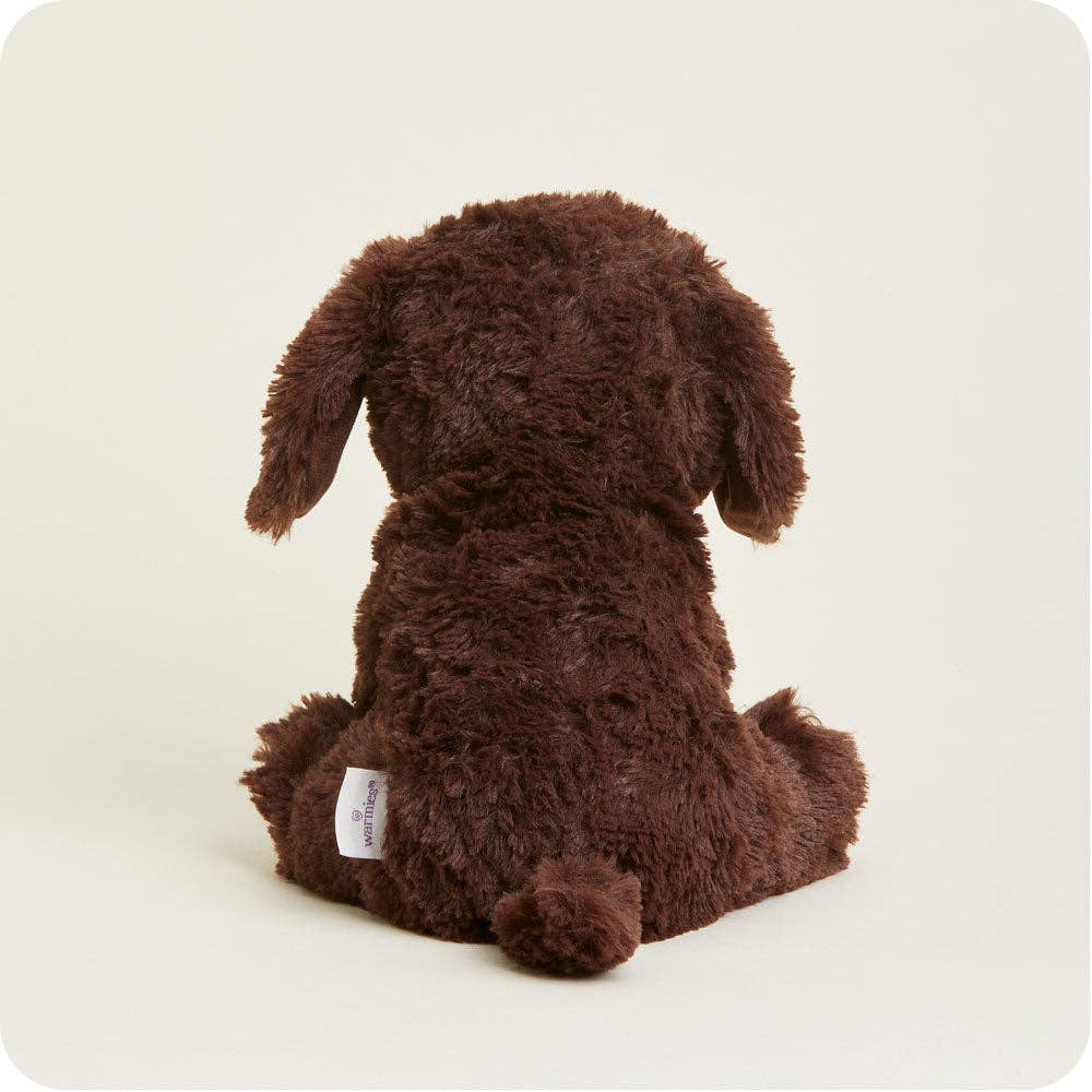 Brown plush dog toy on a white background