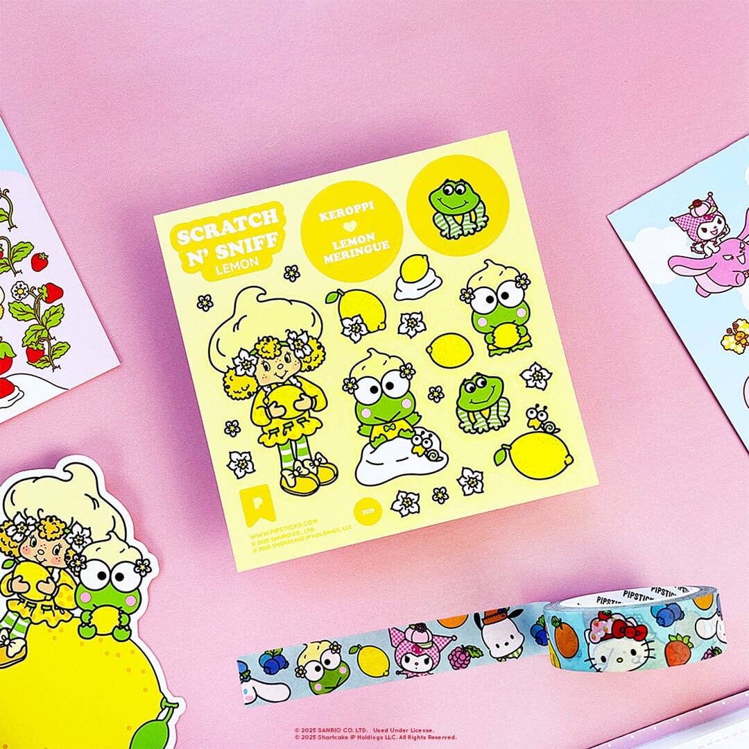 Lemon Scratch and sniff stickers with sanrio and strawberry shortcake characters on a pink background