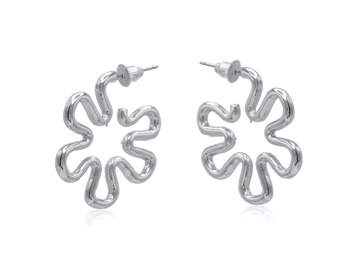 Silver floral hoop earrings on a white background