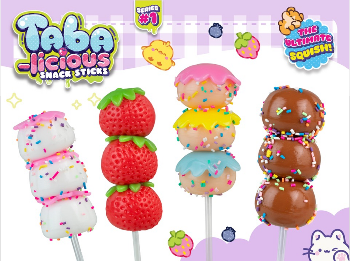 Colorful snack sticks toys with strawberry, cake, and donut shapes on a white background with 'Taba-licious' branding.