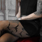 Asymmetric Bat Fishnet Tights