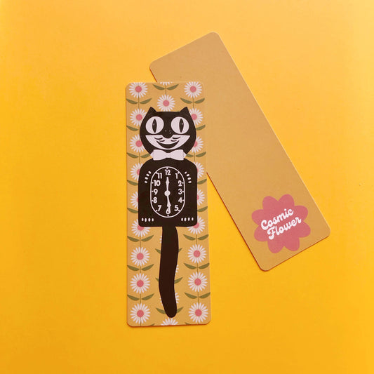 Bookmark with a vintage Kitty Kat Klock design on a yellow background