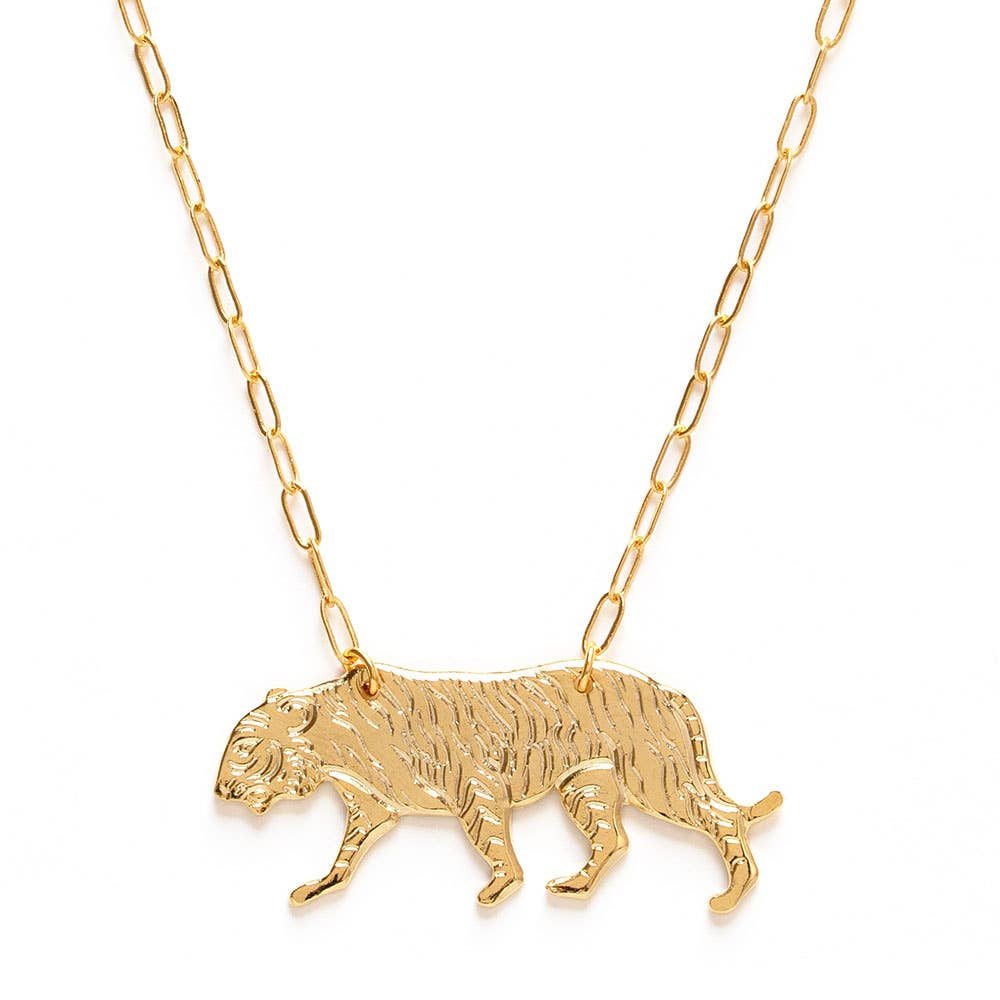Gold tiger pendant chain necklace on a white background