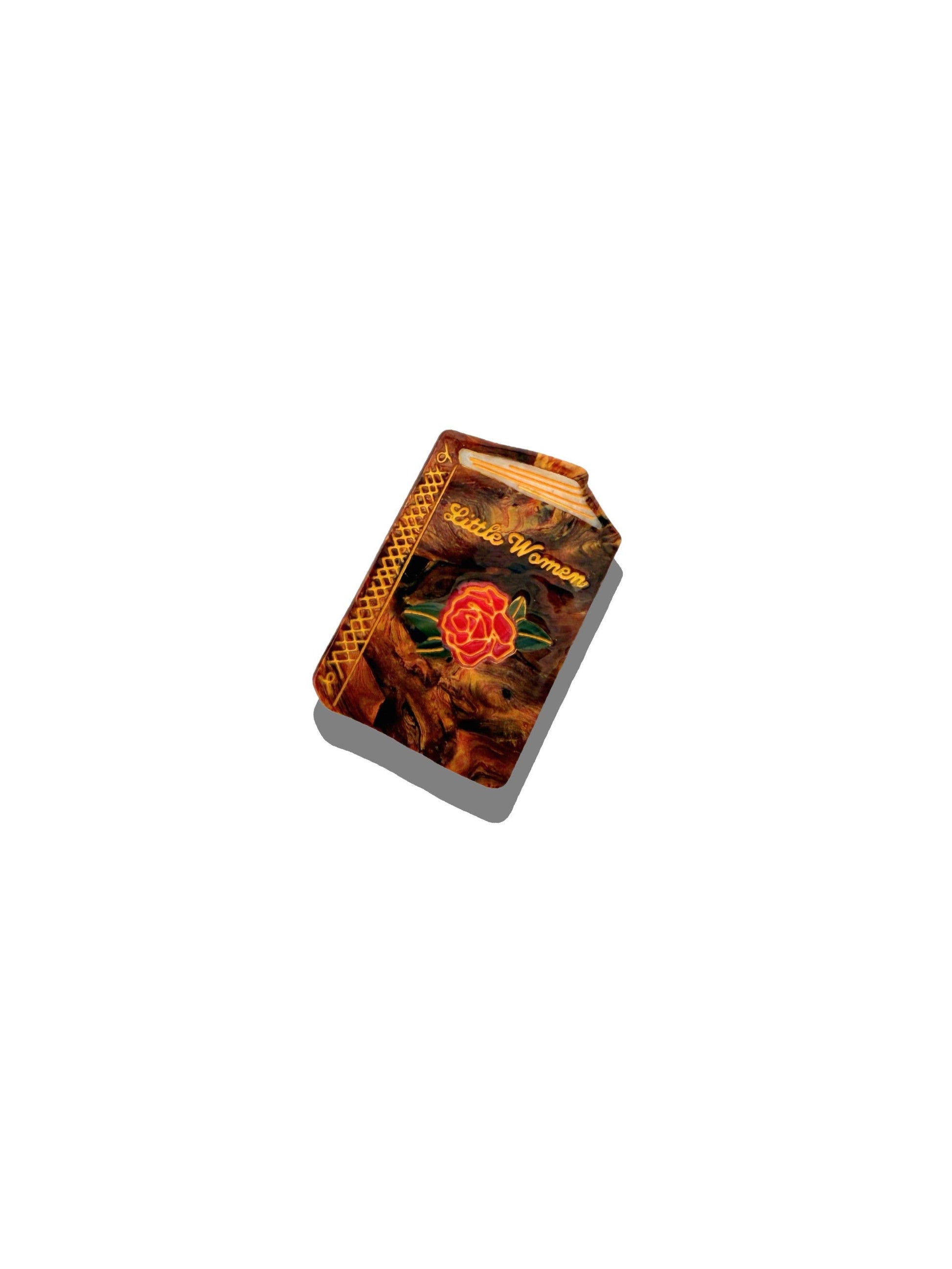 Small book claw clip with "Little Women" on a white background