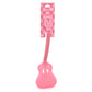 Pink guitar-shaped spatula with packaging on a white background