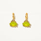 Green frog-shaped earrings with gold hooks on a white background