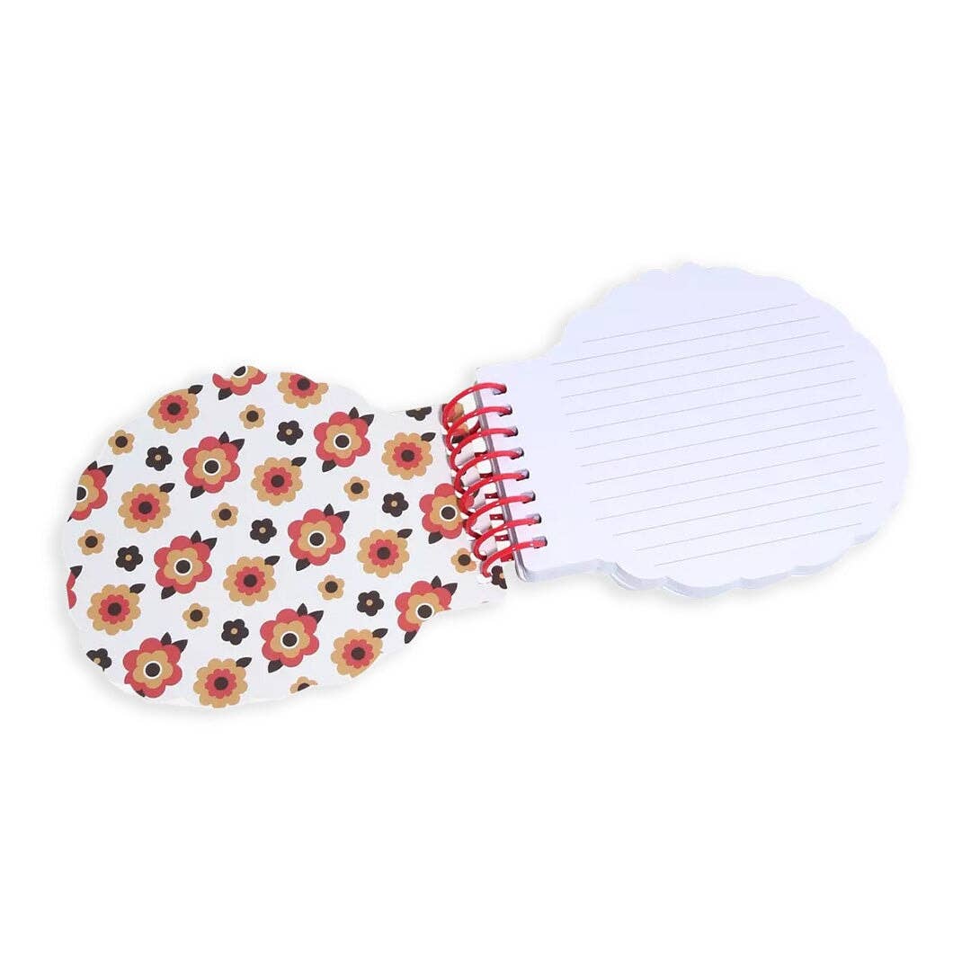 Notebook with floral pattern on a white background