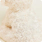 Close-up of a fluffy beige fabric texture