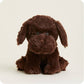 Brown plush dog toy on a light beige background