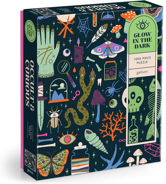 Glow-in-the-dark puzzle box with occult-themed design on a white background