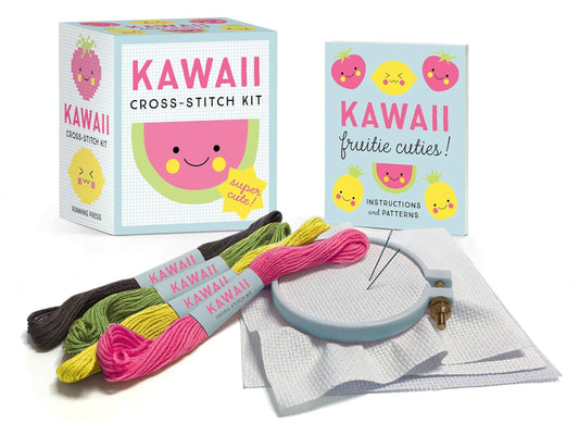 Kawaii cross-stitch kit with colorful threads and an embroidery hoop on a white background