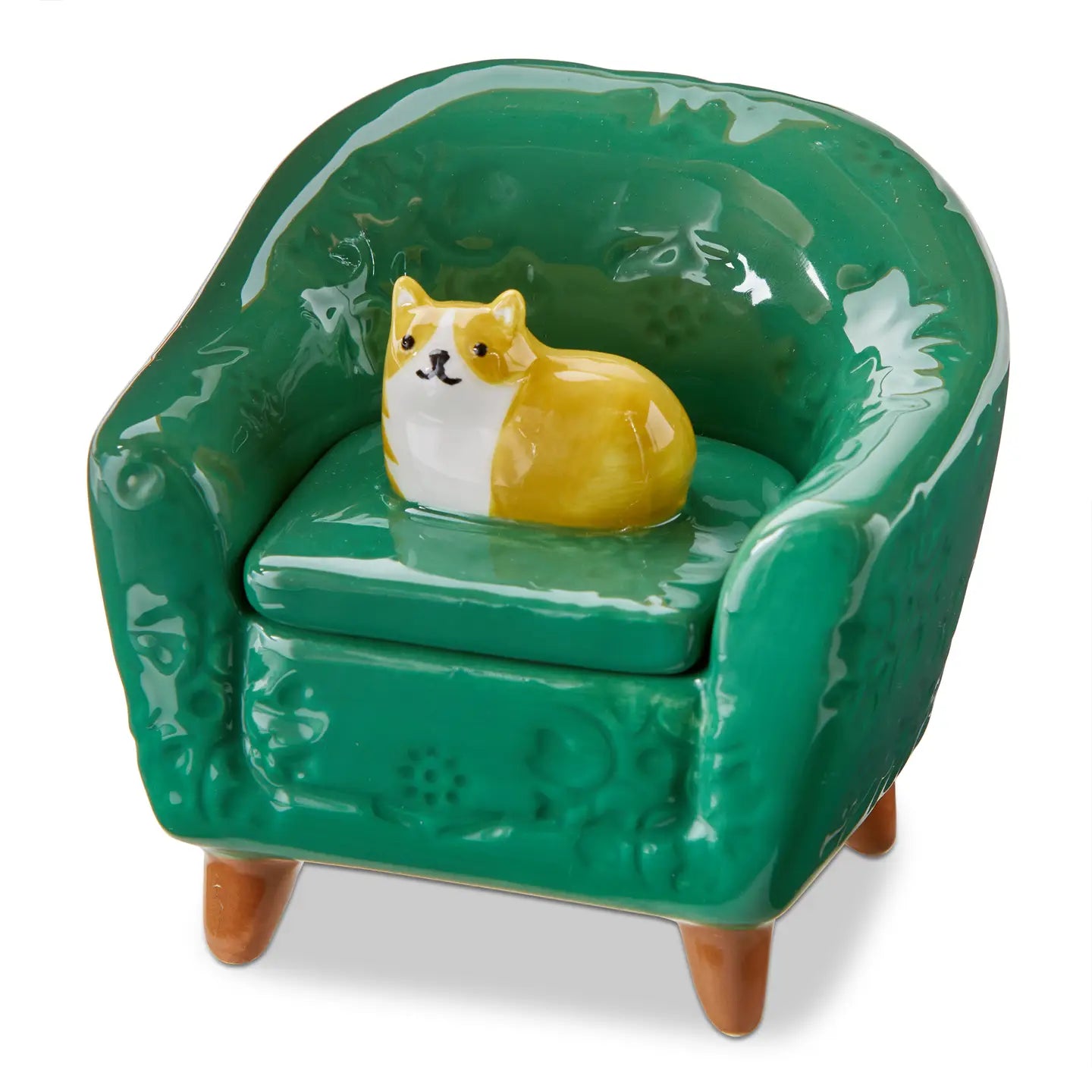 Green chair with a cat figurine on a white background