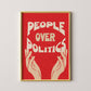 Framed poster with 'People Over Politics' text on a red background