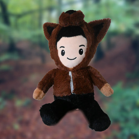 Plush toy of Jacob from Twilight in a brown animal costume with a forest background