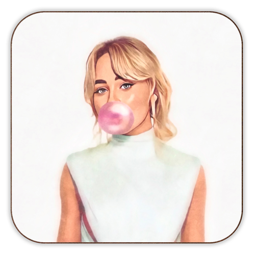 Sabrina Carpenter blowing a pink bubble of gum on a white background