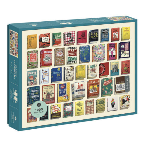 Jigsaw puzzle box with vintage cookbooks on a white background