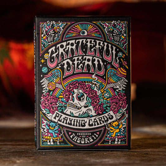 Grateful Dead playing cards with colorful design on a dark background