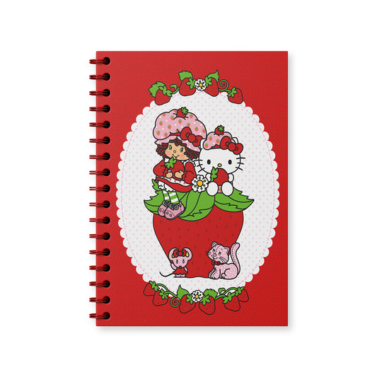Red notebook with strawberry shortcake and hello kitty with a strawberry design on a white background