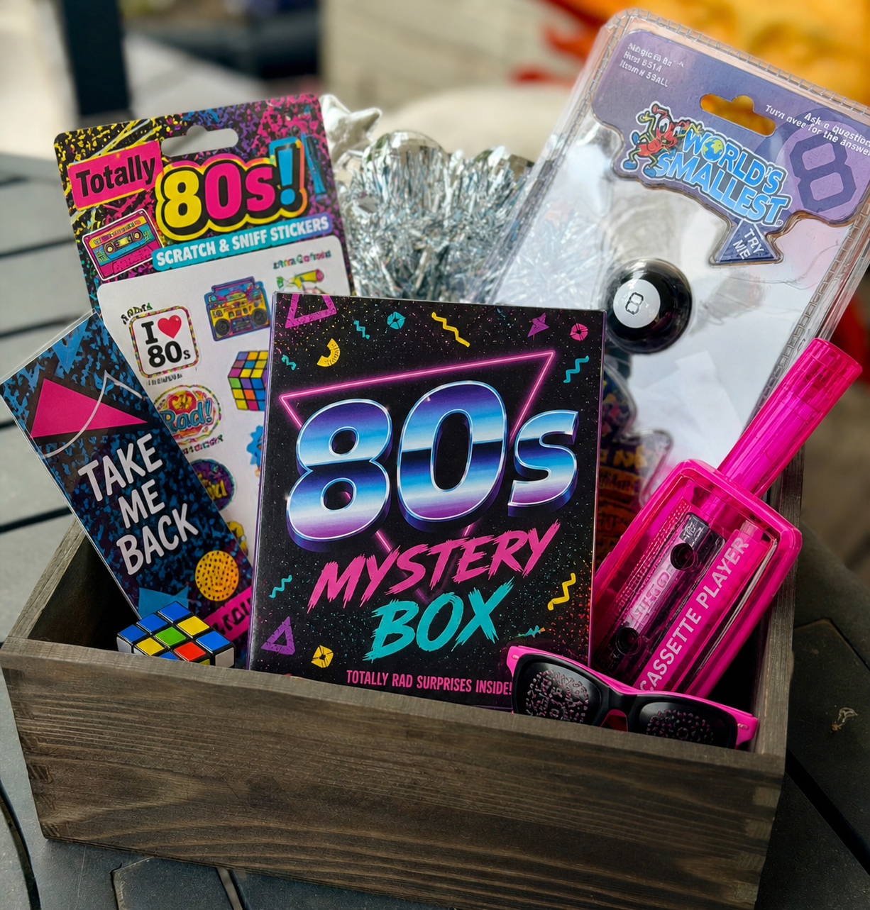 80s-themed mystery box with various retro items and packaging.
