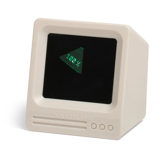 Computer display with a beige casing and green screen on a white background