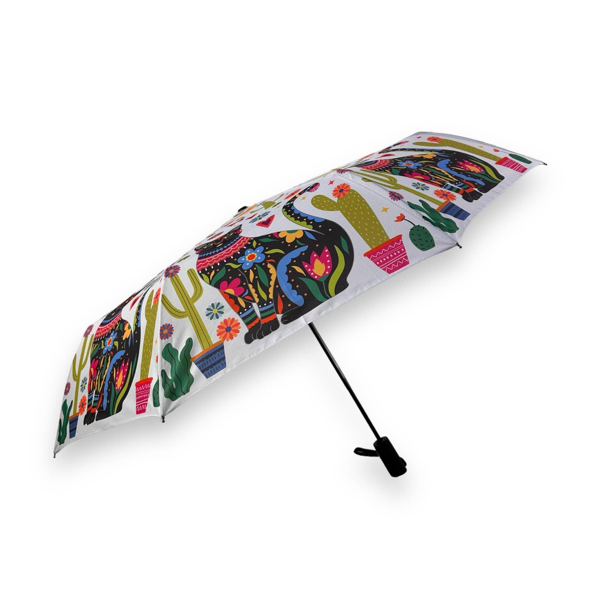 Colorful umbrella with elephant and cactus design on a white background