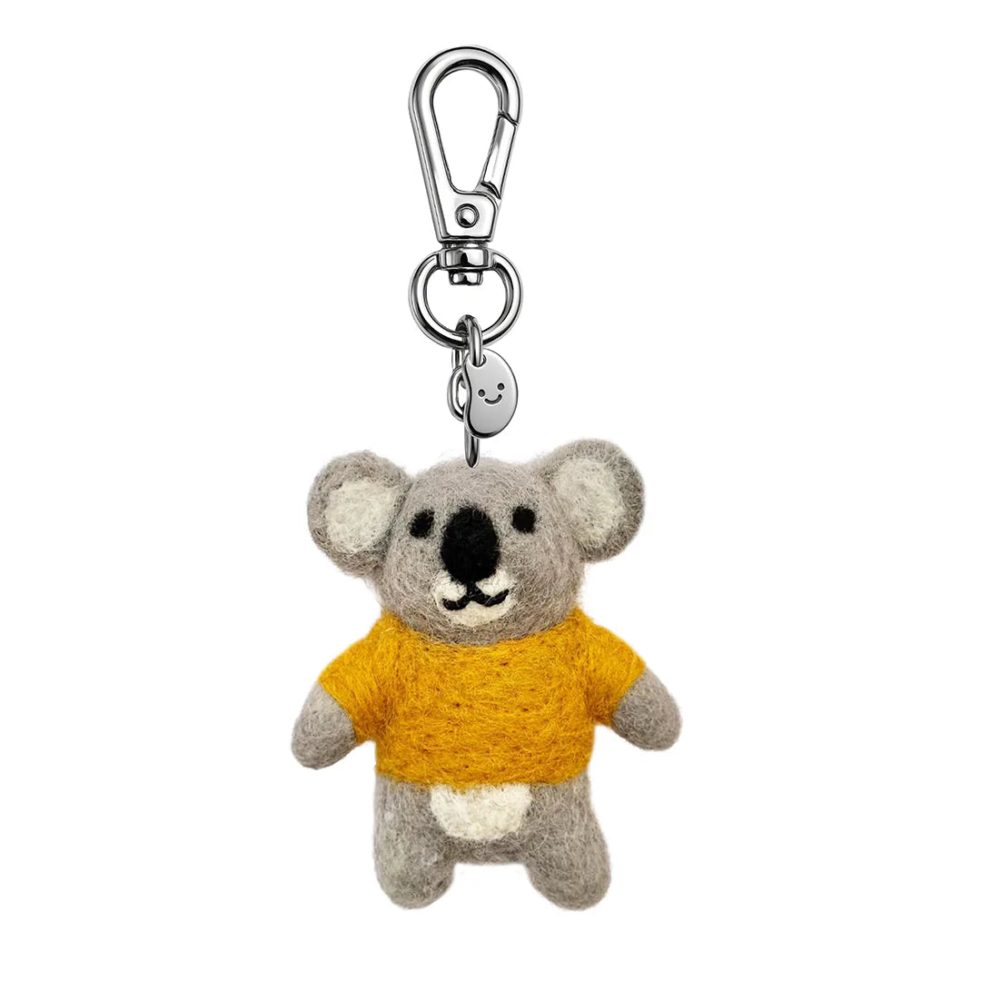 Plush koala keychain with a yellow sweater on a white background
