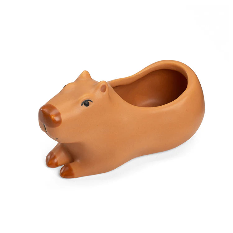 Brown capybara planter on a white background