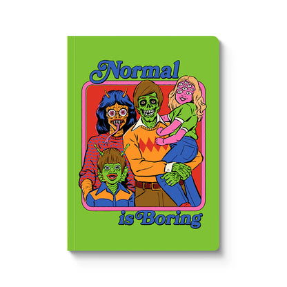 Notebook with colorful illustration of four monsters and text 'Normal is Boring' on a green background