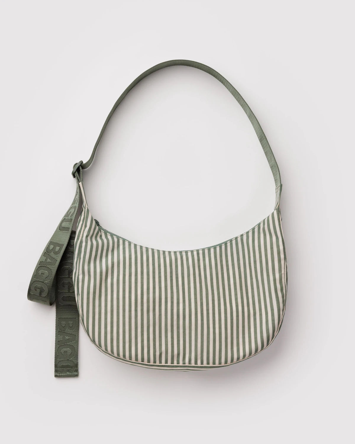 Green and white striped shoulder bag on a light gray background