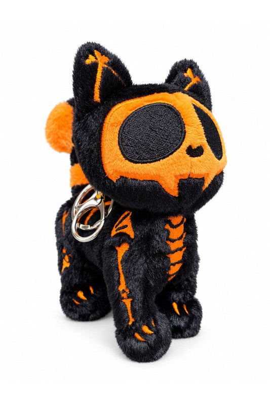 A black plush cat keychain with orange skeleton and eye details, featuring a silver metal keyring, set against a plain white background.