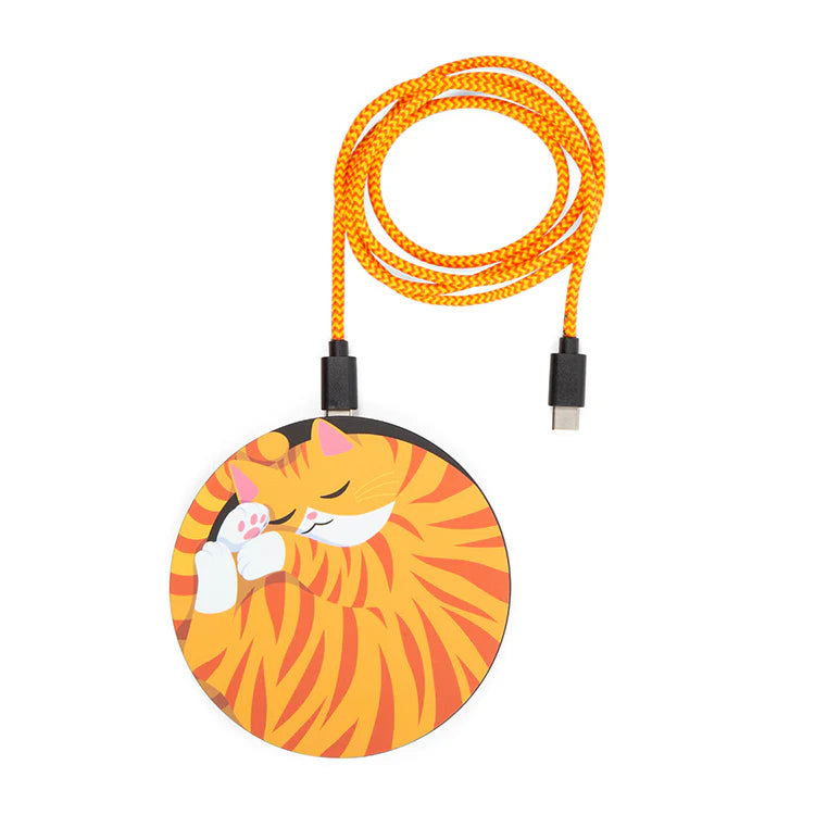 Round wireless charger with a cat design and orange braided cable on a white background